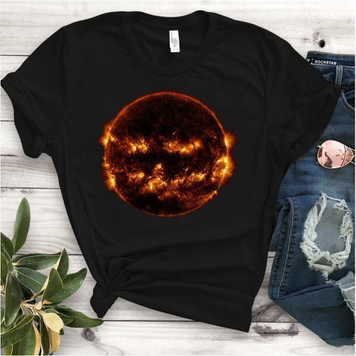 Sun 'smiles' like a Halloween pumpkin in NASA Shirt